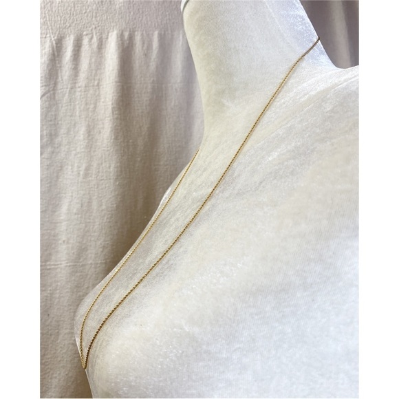 Long gold tone twisted rope necklace perfect for layering - Picture 2 of 5